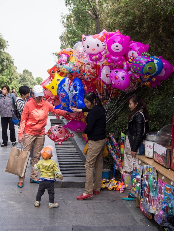 Balloon vendor along the Chinese stars path